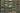Shelf filled with various CDs and DVDs in a grid pattern