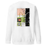 Back view of a solid-colored sweatshirt. A large collage graphic is centered on the upper back, composed of several rectangular panels. The design features the vertical text "ANBY DEMARA" and a large, high-contrast profile illustration of a character with rabbit-like ears.
