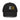 A black distressed baseball cap shown from the front. The cap features an embroidered graphic on the front that includes a white stylized character or symbol to the left, and a bright yellow "X" to its right. The cap has intentional rips and fraying on the brim and crown, giving it a worn look.