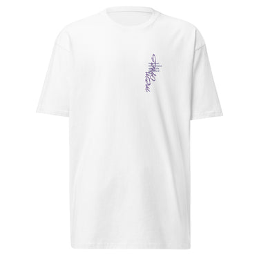 Front view of a solid-colored shirt. A small, vertical graphic on the left chest features the text “Memories" in an elegant, high-contrast script font, alongside a small block of horizontal text.