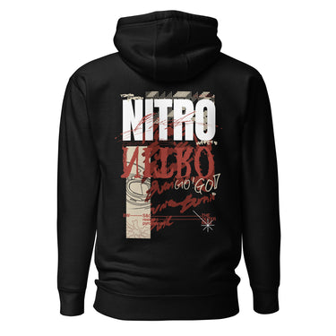 Back view of a solid-colored, oversized hoodie. A large, vertical collage graphic with a distressed aesthetic is centered on the upper back. It features the bold text "NITRO", a graffiti-style word, a line drawing of an biker helmet, and various other textures and symbols.