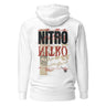 Back view of a solid-colored, oversized hoodie. A large, vertical collage graphic with a distressed aesthetic is centered on the upper back. It features the bold text "NITRO", a graffiti-style word, a line drawing of an biker helmet, and various other textures and symbols.