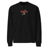 Front view of a solid-colored, oversized longsleeve. A small graphic is centered on the chest, featuring the word "Burnice" in a high-contrast, gothic-style blackletter font, with subtle, sketchy lines in the background.