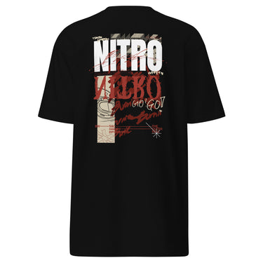 Back view of a solid-colored, oversized shirt. A large, vertical collage graphic with a distressed aesthetic is centered on the upper back. It features the bold text "NITRO", a graffiti-style word, a line drawing of an biker helmet, and various other textures and symbols.