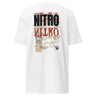 Back view of a solid-colored, oversized shirt. A large, vertical collage graphic with a distressed aesthetic is centered on the upper back. It features the bold text "NITRO", a graffiti-style word, a line drawing of an biker helmet, and various other textures and symbols.