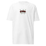 Front view of a solid-colored, shirt. A small graphic is centered on the chest, featuring the word "Caesar" in a stylized script font, layered over a background of sketchy, crisscrossing lines.