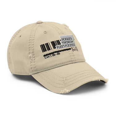 A distressed khaki baseball cap. The front features an embroidered graphic that mimics a product label. The design includes a black barcode, a gray patch with the words "ROGUES" and "TRICKERY," and the words "FLEET-FOOTED" below in black thread.