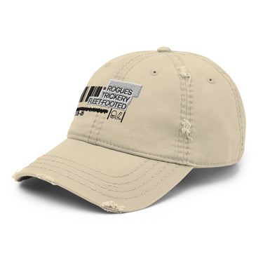 A distressed khaki baseball cap. The front features an embroidered graphic that mimics a product label. The design includes a black barcode, a gray patch with the words "ROGUES" and "TRICKERY," and the words "FLEET-FOOTED" below in black thread.