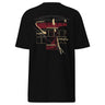 Back view of a solid-colored, shirt. A large collage graphic is centered on the back, dominated by large, overlapping, outline-style typography. The design is layered with rectangular blocks, fine sketchy lines, and multiple smaller blocks of text, creating a deconstructed, schematic look. Featured text includes “Fire” “Atk” “Chevalier” “Dance of fire” “Dreamweave” amongst other phrases.
