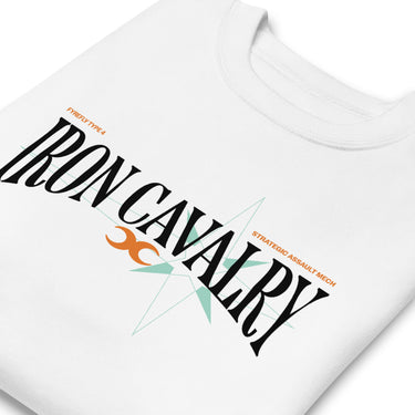 A white folded sweatshirt featuring a graphic design. The design includes the words "IRON CAVALRY" in large black stylized font, angled upwards from left to right. Above "IRON CAVALRY" on the left, it reads "FIREFLY TYPE 4" in a smaller font. Below and to the right of "IRON CAVALRY," it says "STRATEGIC ASSAULT MECH," also in a smaller font. Centered beneath the word "IRON," there's an orange symbol that resembles two intertwined C-shapes. Behind the text and symbol, a light blue starburst graphic with thin 