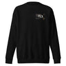 Back view of a solid-colored sweatshirt. A large, symmetrical graphic is centered on the upper back. It features the text "PURSUITS end" integrated with a large, ornate, star-like emblem. Below are two fine-line illustrations of hands, one holding a key and the other a lock.