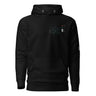 Front view of a solid-colored hoodie. A small graphic on the left chest features a geometric, flower-like symbol made of fine lines, next to a vertical block of technical-style text.