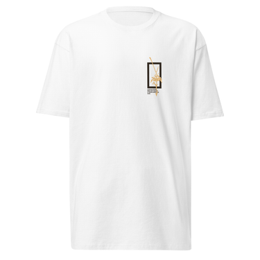 Front view of a solid-colored shirt. A small graphic on the chest features a vertical rectangular frame containing a high-contrast floral illustration and a sword-like shape.
