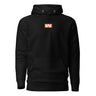 Black hoodie, front view, featuring a small centered orange rectangular logo with a stylized white 'M' inside.