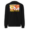 Black longsleeve, back view, showcasing a large abstract graphic in orange, yellow, black, and white. The design includes bold typography, Japanese characters, geometric shapes, and layered text overlaid with dynamic line art and circular motifs.