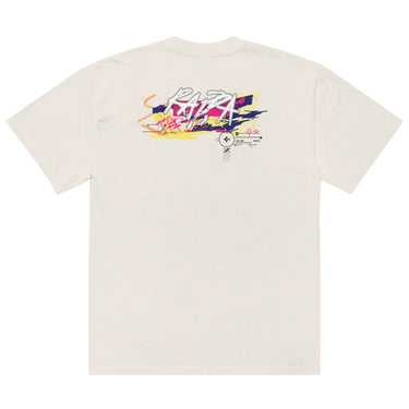 Back view of a solid-colored oversized-tee. A large, horizontal graphic on the upper back features a stylized, graffiti-like word spelling “RAPPA” layered over a wide smear of high-contrast brush strokes imitating graffiti splatter. To the side are smaller, schematic graphics including a compass rose and blocks of text.