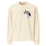 Front view of a longsleeve. A small graphic on the left chest features the word "abyss" in a black script font, layered over abstract streaks of periwinkle blue and distorted black shapes.