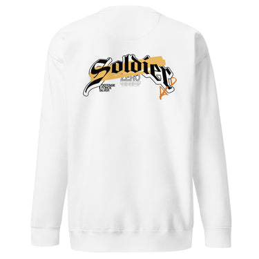 Back view of a solid-colored, sweatshirt. A large, horizontal graphic on the upper back features the word "Soldier" in a high-contrast, stylized script font. This is layered over a wide brushstroke shape and several smaller blocks of text, and san serif text featuring the word “Zero”