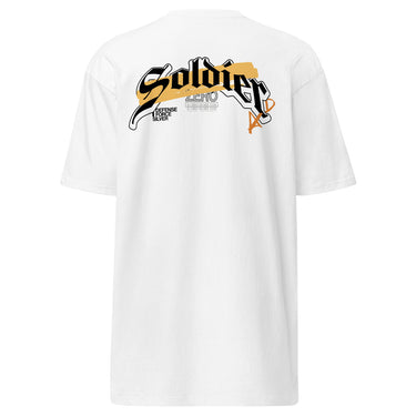 Back view of a solid-colored, shirt. A large, horizontal graphic on the upper back features the word "Soldier" in a high-contrast, stylized script font. This is layered over a wide brushstroke shape and several smaller blocks of text, and san serif text featuring the word “Zero”