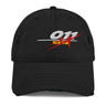A black distressed baseball cap shown from the front. The cap features an embroidered graphic with the white numbers "011" on top of a horizontal white line. Below the line, a red starburst or explosion graphic is visible, with some yellow detail in its center. The cap has intentional rips and fraying on the brim and crown, giving it a distressed look.