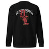 Back view of a solid-colored sweatshirt. A large, ornate graphic on the upper back features the text "at your service" arched over a large, high-contrast gothic monogram. The design is embellished with fine-line scrollwork and 3d lettering of V and L in blackletter font.