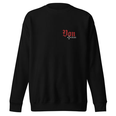 Front view of a solid-colored sweatshirt. A small, embroidered graphic on the left chest features the word "Von" in a large, high-contrast gothic font, with the word "LYCAON" and a cross symbol below it.