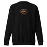 Front view of a solid-colored sweatshirt. A small, circular emblem is centered on the chest, featuring rings of text such as "NEW ERIDU PUBLIC SAFETY". A large, high-contrast Chinese character “Zhu” is layered over the center.