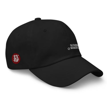 3/4 view of an baseball cap in black. Evernight inspired design shows embroidered text on the front reading “SLUMBER NOW O WAKEFUL WORLD.” The side panel shows a red circular patch with a character symbol.