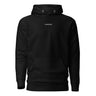 Front view of an hoodie in black. Minimal design featuring a small white lowercase word “constance” centered across the upper chest. The typography is clean and modern, standing out subtly against the solid black fabric.