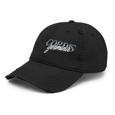 3/4 view of an distressed hat in black. Embroided text reading “Cordis Germina” visible on the crown.