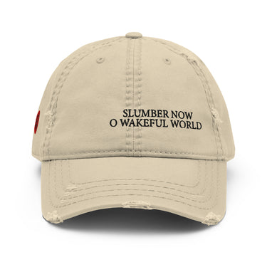 Front view of an distressed hat in khaki. Evernight inspired design, shows off-centered embroidered text leaning right that reads “SLUMBER NOW O WAKEFUL WORLD.”