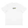 Front view of a box tee in white, flat. A small graphic on the left chest resembles a product label, featuring a black barcode next to a pale yellow box with the words "ROGUES" and "FLEET-FOOTED" inside.
