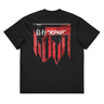 Back view of a box tee in black. A large HUD-style graphic dominates the upper back, pairing a bold 'DEPART' wordmark with the stacked characters '启行' above a jagged red banner shaped like a torn transit map, its silhouette faintly tracing a figure's profile. Dense micro-typography runs down both sides in vertical blocks of English verse about starlight and a dead sun, framed by sunburst icons, a small red stamp reading '旅未终,' and a technical grid header labeled '2nd/SP.'