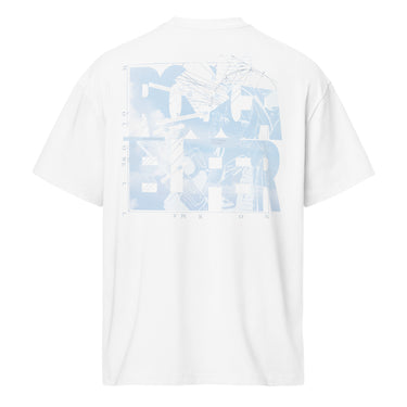Back view of a box tee in white. A large square collage in pale sky blue layers oversized fragmented lettering over clouds, handwritten script and geometric diagram lines. Numbered index strips read 'Total Unity', 'Genius-Villain Paradox' and 'Chain of Genesis', with smaller labels for 'experiment log' and 'tech status: unstable'. A thin border frames the panel, with the name set vertically down the left edge.