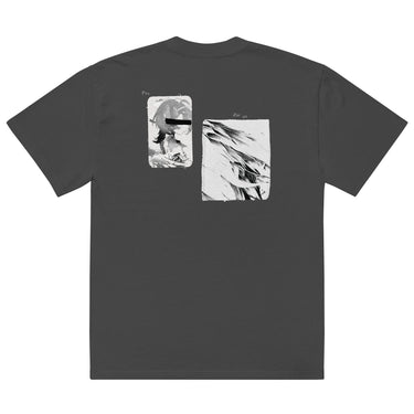 Back view of an oversized tee in faded black. A large two-panel composition fills the back. On the left, a halftoned portrait with a solid black bar across the eyes; to the right, a wider panel of sweeping feathers in heavy contrast. The words "pas" and "d'aveu" float above them in a fine serif, the letters spaced apart and drifting.