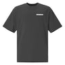 Front view of a oversized tee in faded black. A bold 'DECIMATION' wordmark sits on the left chest in crisp white type, with a small red sparkle accent stamped beside it.