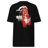 Back view of a T-Shirt in Black. a large back graphic centered on a jagged, torn-map style emblem in white with a glowing star burst at its center, layered over angled orange-red geometric panels resembling sail or flag fragments, alongside a bold two-line wordmark, a short block of descriptive text, and a smaller diagonal wordmark near the hem