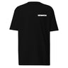 Front view of a t-shirt in black. A bold 'DECIMATION' wordmark sits on the left chest in crisp white type, with a small red sparkle accent stamped beside it.