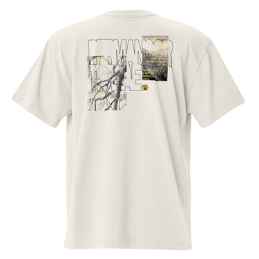 Back view of an oversized tee in faded bone. Main portion of the design features a large, more abstractesque text across the upper back, writing "Permansor Terrae." The design includes large, black-outlined letters, overlaid with a black and white illustration of bare tree branches on the left and a bitmapped image of a mountain range filled with yellow text on the right, accented with distressed gold textures.