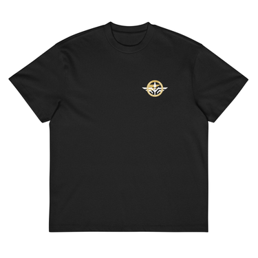 Front view of a box tee in black, flat. A small circular emblem sits on the left chest: a gold ring lettered "MIRACULUM IN CAELO NUMQUAM CADET" in white capitals, with a white winged spearhead standing through its centre and swept wings running out to either side.