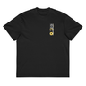Front view of a box tee in black, flat. On the left chest is a small, vertical rectangular graphic containing three East Asian characters in a calligraphy style, positioned above a shape resembling an ancient coin.