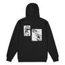 Back view of a zip hoodie in black. A large two-panel composition fills the back. On the left, a halftoned portrait with a solid black bar across the eyes; to the right, a wider panel of sweeping feathers in heavy contrast. The words "pas" and "d'aveu" float above them in a fine serif, the letters spaced apart and drifting.