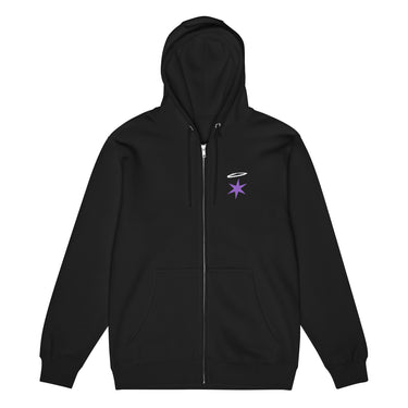 Front view of a zip hoodie in black. A small graphic sits high on the left chest: a loose, hand-drawn halo ring in white tilted above a sharp six-pointed star in soft violet. Both shapes print flat, the ring's brushed edges left rough and unfinished.