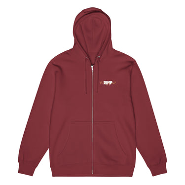 Front view of a Zip Hoodie in Burgundy. a small chest graphic pairing a gold cursive wordmark partially overlaid by a bold white stylized emblem, with a block-letter word underneath in the same gold tone