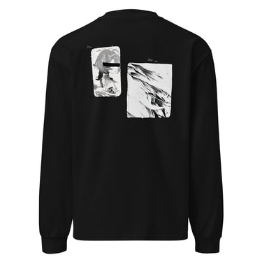 Back view of a longsleeve in black. A large two-panel composition fills the back. On the left, a halftoned portrait with a solid black bar across the eyes; to the right, a wider panel of sweeping feathers in heavy contrast. The words "pas" and "d'aveu" float above them in a fine serif, the letters spaced apart and drifting.