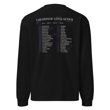 Back view of a longsleeve in black. A large graphic fills the upper back, laid out like a concert tour poster. A wide display serif title reads "VARIATIONS OF A STELLAR TOUR" in white, with a small italic "robin" and "/summeretto" tucked beneath it and a ruled row of four era markers below that. Two columns of dated stops run down the rest in condensed capitals, the dates set in violet, with thin outlined starbursts drifting across the list.