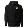Front view of a hoodie in Black. A small circular emblem sits on the left chest: a gold ring lettered "MIRACULUM IN CAELO NUMQUAM CADET" in white capitals, with a white winged spearhead standing through its centre and swept wings running out to either side.