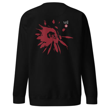 Back view of an sweatshirt in black. HSR Evernight inspired design shows a large abstract red flower graphic in the center. Above the flower, text reads “veil” with a red circular stamp containing a chinese character.