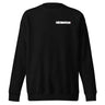 Front view of a sweatshirt in black. A bold 'DECIMATION' wordmark sits on the left chest in crisp white type, with a small red sparkle accent stamped beside it.