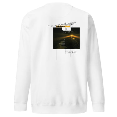 Back view of an sweatshirt in white. Design shows a rectangular grayscale graphic centered on the upper back showing a lighthouse shining into darkness. Above the image is a yellow label reading “LIGHTKEEPER,” surrounded by thin white grid lines and handwritten script text for a technical, conceptual design aesthetic